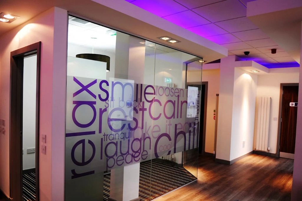 Relax, smile, calm words on G1 Dental glass